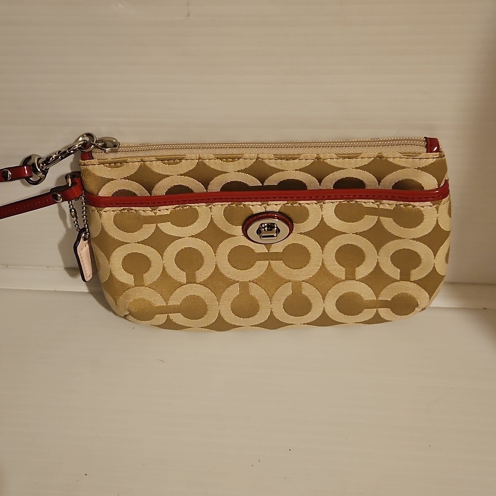 New Coach cream and pink wristlet